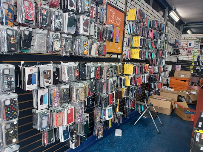 A store with a large display of cell phones